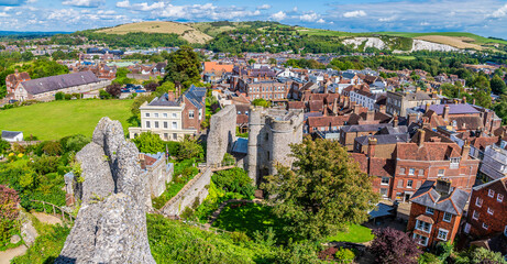 Fototapeta na wymiar A view east over the castle grounds and High Street from the ramparts of the castle keep in Lewes, Sussex, UK in summertime