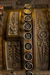 Old Cash Register in close up shot. Antique style cashier register