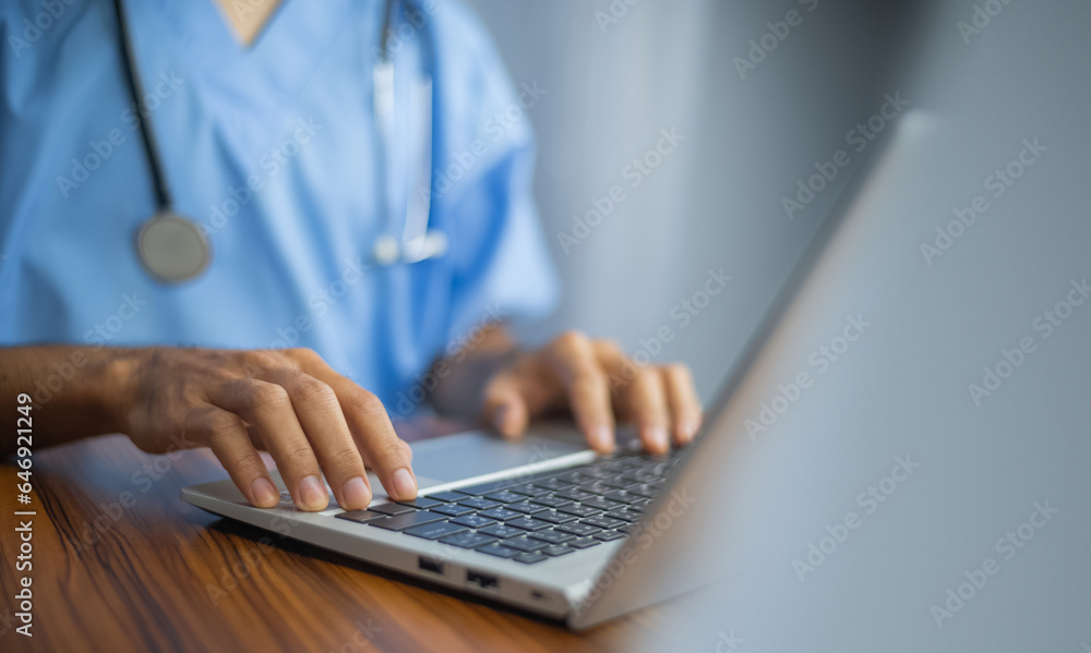 Poster doctor using computer typing on keyboard. doctor computer