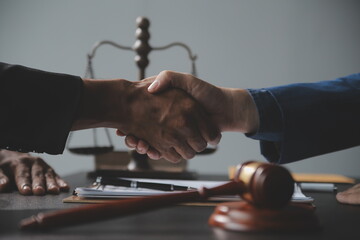 Customer service good cooperation, Consultation between a Businessman and Male lawyer or judge consult having team meeting with client, Law and Legal services concept.