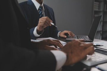 Financial Business woman analyze the graph of the company's performance to create profits and...