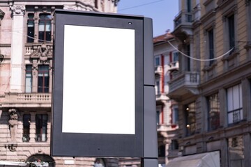 Blank white poster in the streets of Milan.