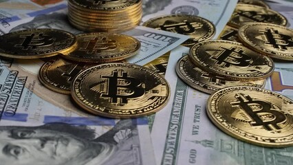 American Dollars and Bitcoins on the table