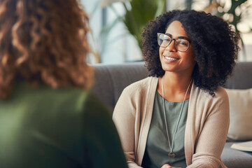 African American female counselor demonstrating empathy during a breakthrough session with a client, highlighting the importance of mental health support and therapeutic communication - obrazy, fototapety, plakaty