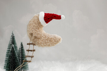Newborn digital backdrop with moon and santa claus hat on clouds background.  Newborn christmas...