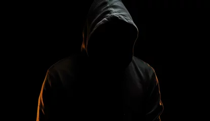 Fotobehang Hooded man on black background, AI generative, darkness, silhouette © Creative Pixels