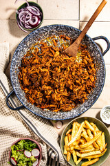 pulled pork with french fries and vegetables - 646951636