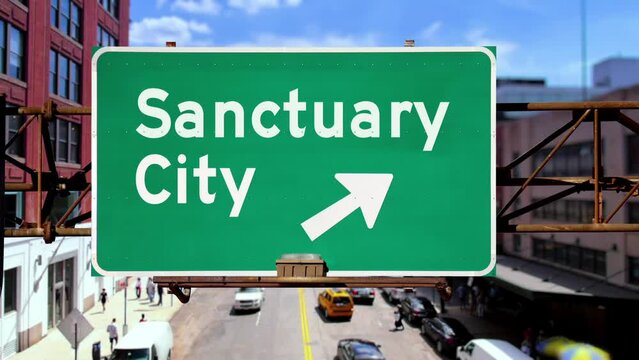 A hypothetical Sanctuary City highway road sign in the Chelsea district of New York City.  	