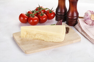 Piece Italian hard parmesan cheese