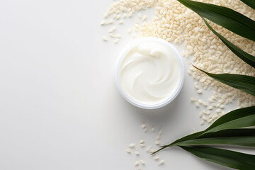 Obraz na płótnie Canvas Cosmetic skin care product body lotion, face cream or mask on background of rice or oatmeal