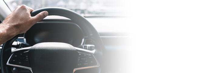 Driver car in car interior banner background. Driving on road. Hands on the steering wheel...