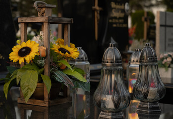 Sunlowers and gravelight on the tomb.