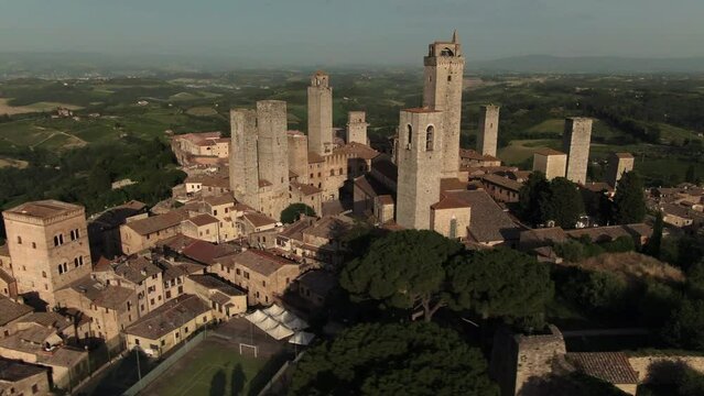 Aerial of historic San Gimignano skyline and city center in Tuscany, Italy 4