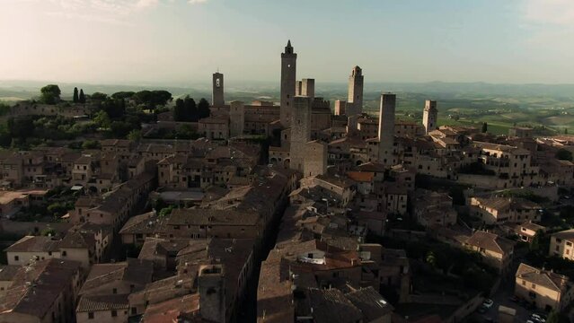 Aerial of historic San Gimignano skyline and city center in Tuscany, Italy 1