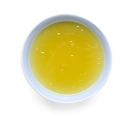 Bowl of tasty vegetable broth on white background