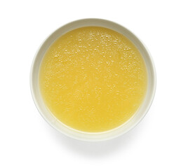 Bowl of tasty vegetable broth on white background