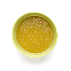 Bowl of tasty vegetable broth on white background