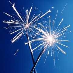 Silver white party sparklers on a gradient blue background