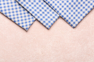 Set of clean napkins on color background