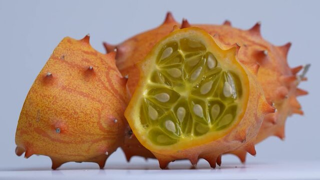Kiwiano fruit spinning around on a table