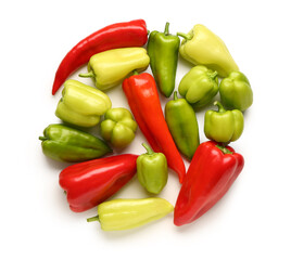 Different fresh peppers on white background