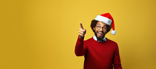 Fototapeta na wymiar A man wearing a Santa Claus hat and glasses smiling and pointing with his hand in the opposite direction. Generative AI