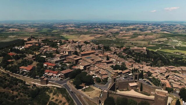 Aerial of historic hilltop castle town in the Tuscan country side, Tuscany, Italy 3