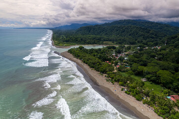 Beautiful aerial view of Dominical Beach and The Baru River in Costa Rica