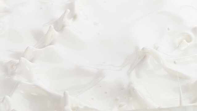 Super slow motion of milk cream. Filmed on high speed cinema camera, 1000fps.