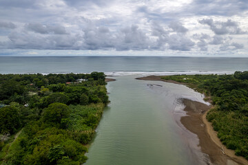 Beautiful aerial view of Dominical Beach and The Baru River in Costa Rica