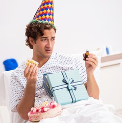 Young man celebrating his birthday in hospital