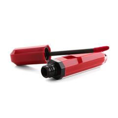 Stylish red lipstick with brush on white background