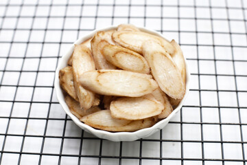 Burdock Root (Gobo) on white background.