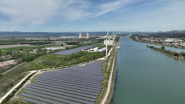 Donz&egrave;re-Mondragon Dam: Aerial insight into its historical green impact.
