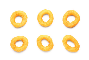 Fried breaded onion rings on white background