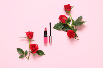 Composition with stylish lipstick, mascara and beautiful red rose flowers on pink background