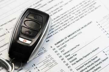 Car Financing Concept, Car Key Fob over Finance, Lease Documents