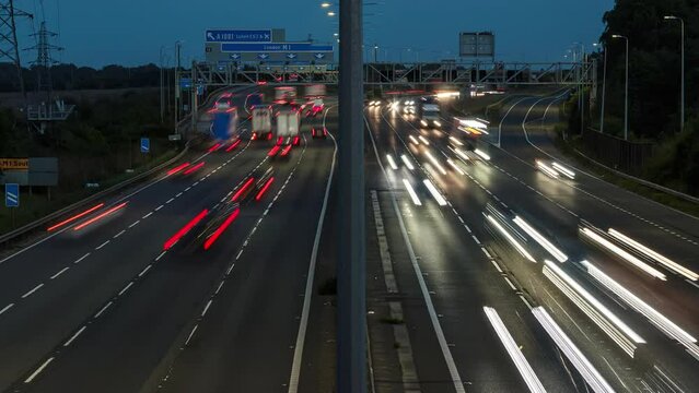 Luton, UK, September 5, 2023: Evening traffic on British motorway M1 near to junction ten. Timelapse style video.