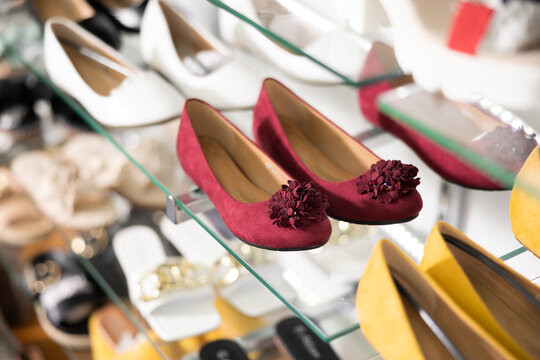Fashion shoes for everyday wear on the shelves of a shoe store