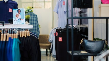 Black friday event in november, clothing store holding exclusive clearance items offers with discounted clothes from various brands. Seasonal sales marketing campaign with neon sign banners.