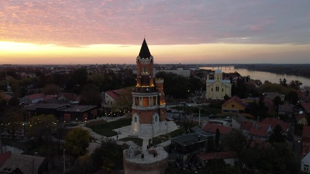 Drone take-off at sunset above Zemun district, Belgrade, Serbia, Europe. 4K