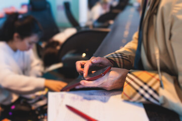 Process of checking in on a conference congress forum event, registration desk table, visitors and...