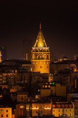 Fototapeta na wymiar Night cityscape of Istanbul with the Galata Tower illuminated, Turkey