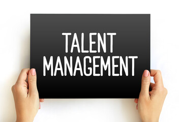 Talent Management - anticipation of required human capital for an organization and the planning to meet those needs, text concept on card
