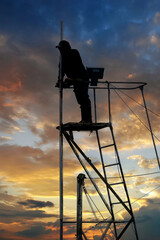 Reefnet salmon fisherman spots salmon swimming into the net.  Reefnetting is considered one of the...