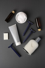 Obraz premium Flat lay composition with shaving accessories for men on grey background