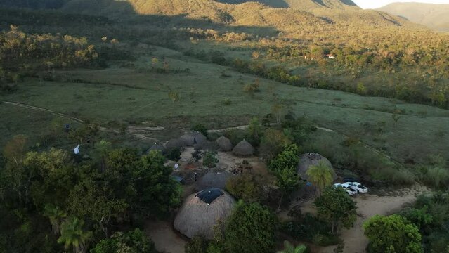 aerial view village in Chapada dos Veadeiros "Aldeia Macaco" hollow-shaped bioconstruction houses cerrado landscape Goi&aacute;s Brazil