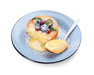 Tasty vanilla fondant with white chocolate and berries isolated on white