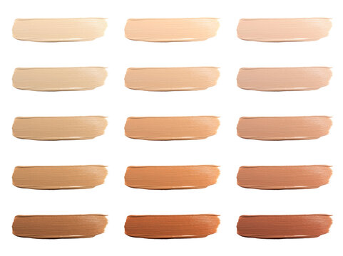 Different shades of liquid skin foundation on white background, top view. Set with samples of makeup product