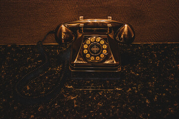 vintage telephone on black